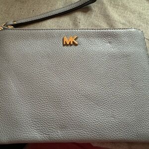 Used MK light blue wristlet, larger size